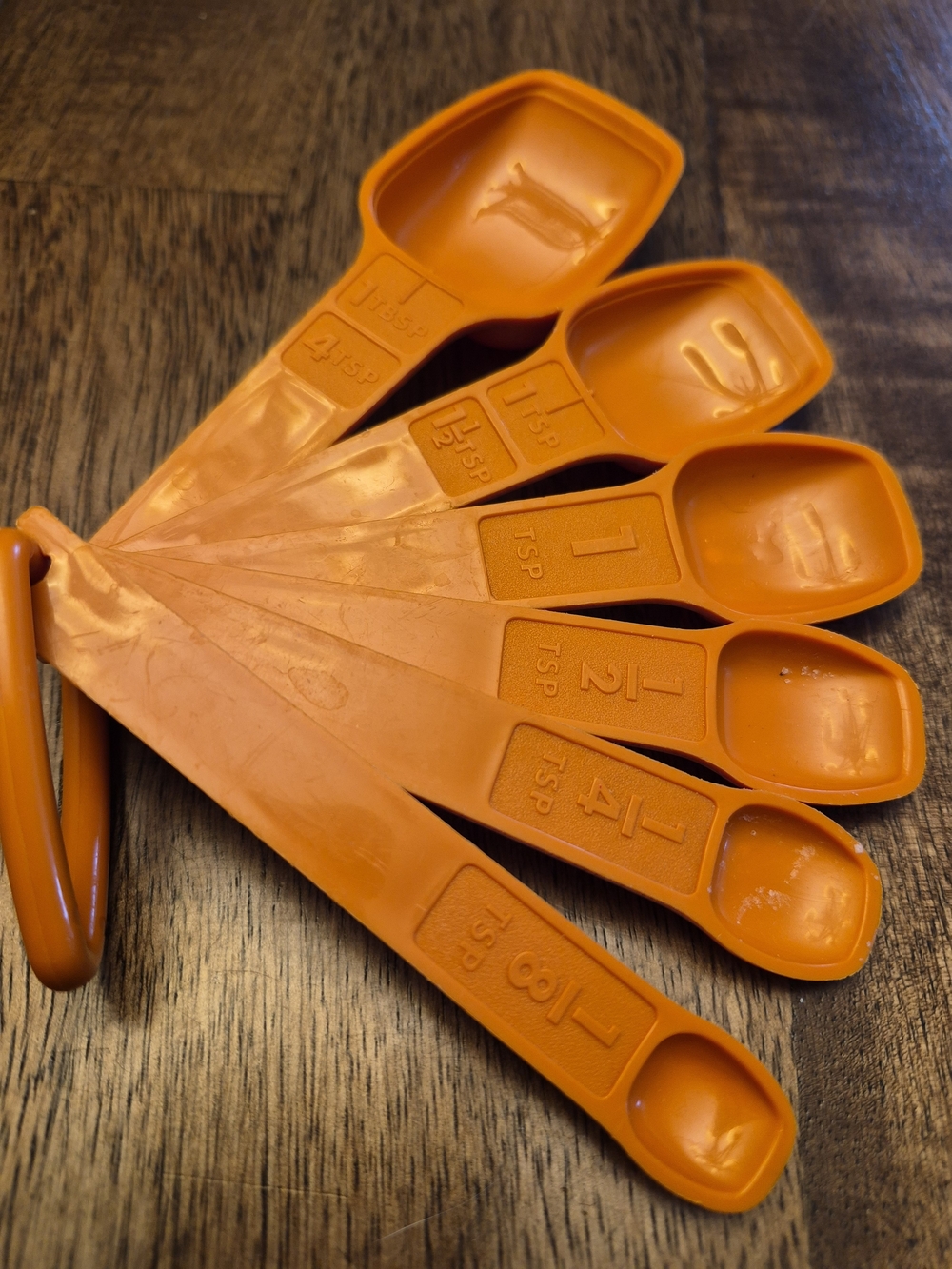 Tupperware Orange Plastic Measuring Spoon Set